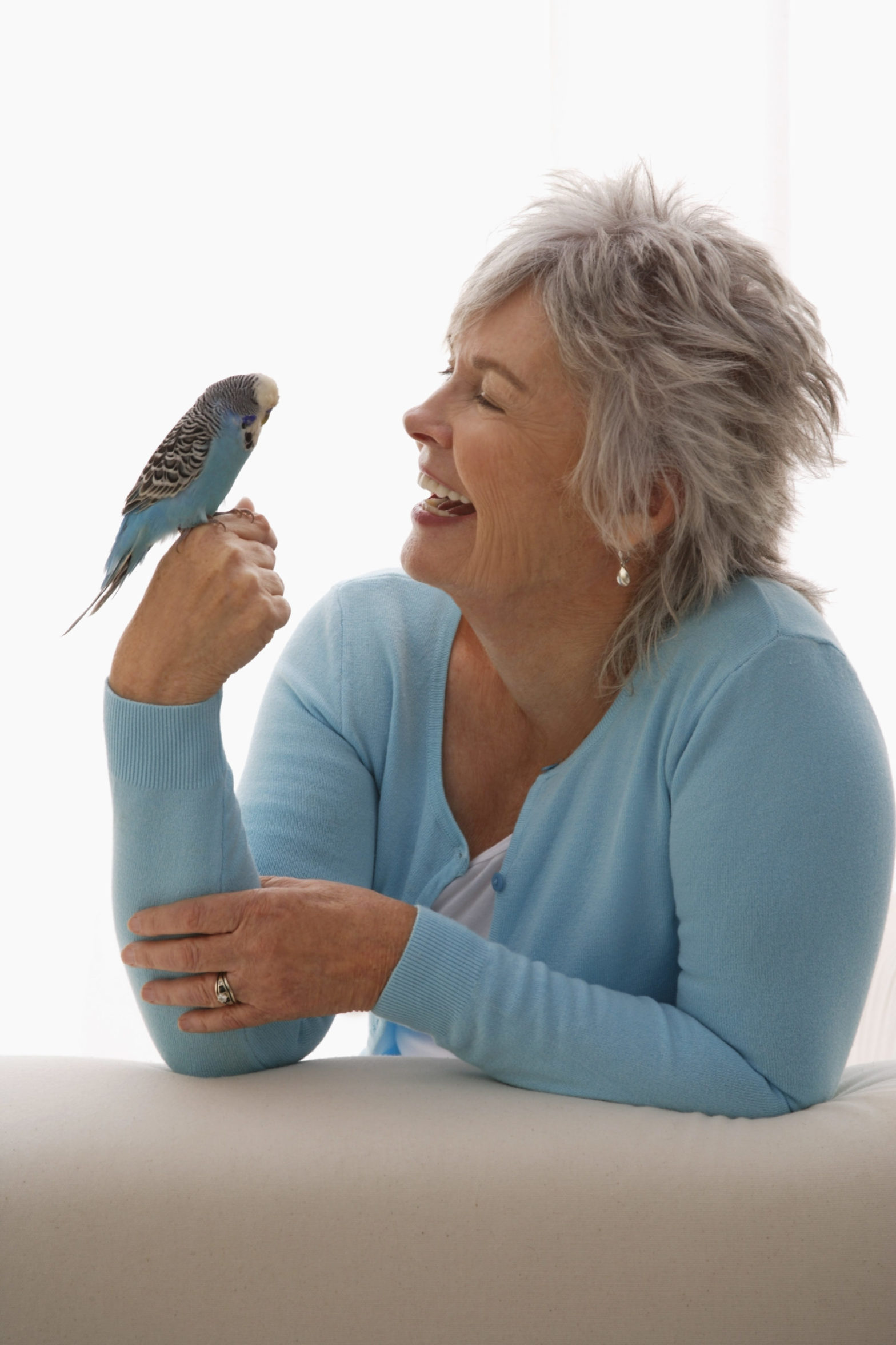 woman holding bird