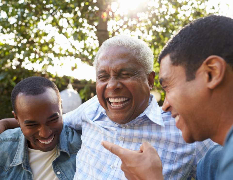 Senior Man Laughing with his son and grandson